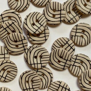 Black lines on off-white buttons 15mm