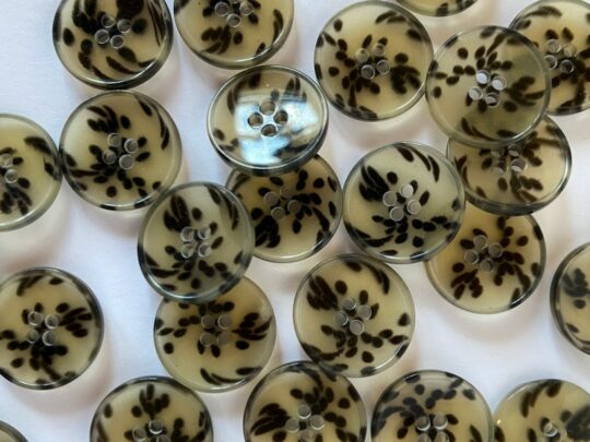 Buttons with suspended black dots 15mm