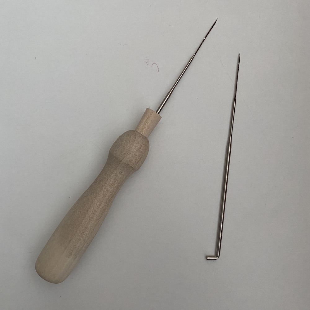 Felting needles and wooden handle